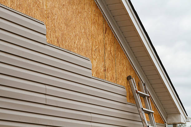Professional Emergency Siding Repair technician working in Slovan, PA